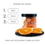 Cómo se usan las rodajas de naranja deshidratada: abrir, servir y wow; rodajas sobre pizarra junto al tarro