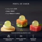 Tres bocados sobre pizarra: galleta con crema, tartar de salmón y dado de sandía, cada uno con una Pearl de Mojito