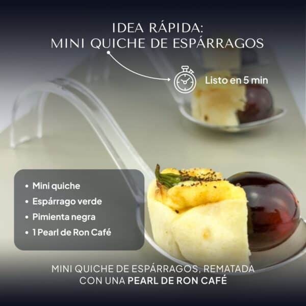 Mini quiche de espárrago verde y pimienta negra rematada con una Pearl de Ron Café