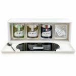 Caja regalo de Pearls abierta con tres frascos, cucharilla y bandeja